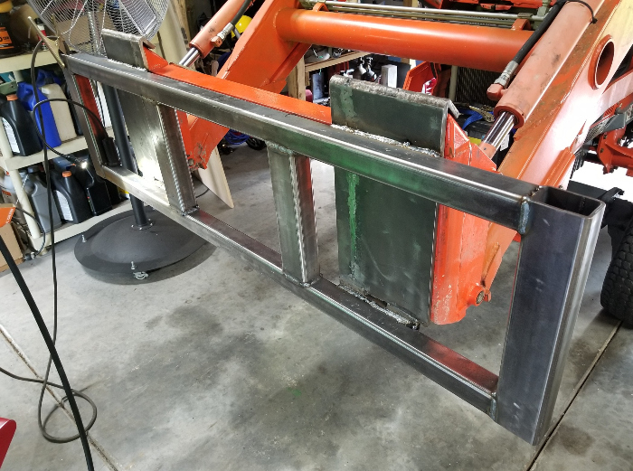 09 25 22 Kubota fork attachment frame on tractor welded to plates small.jpg