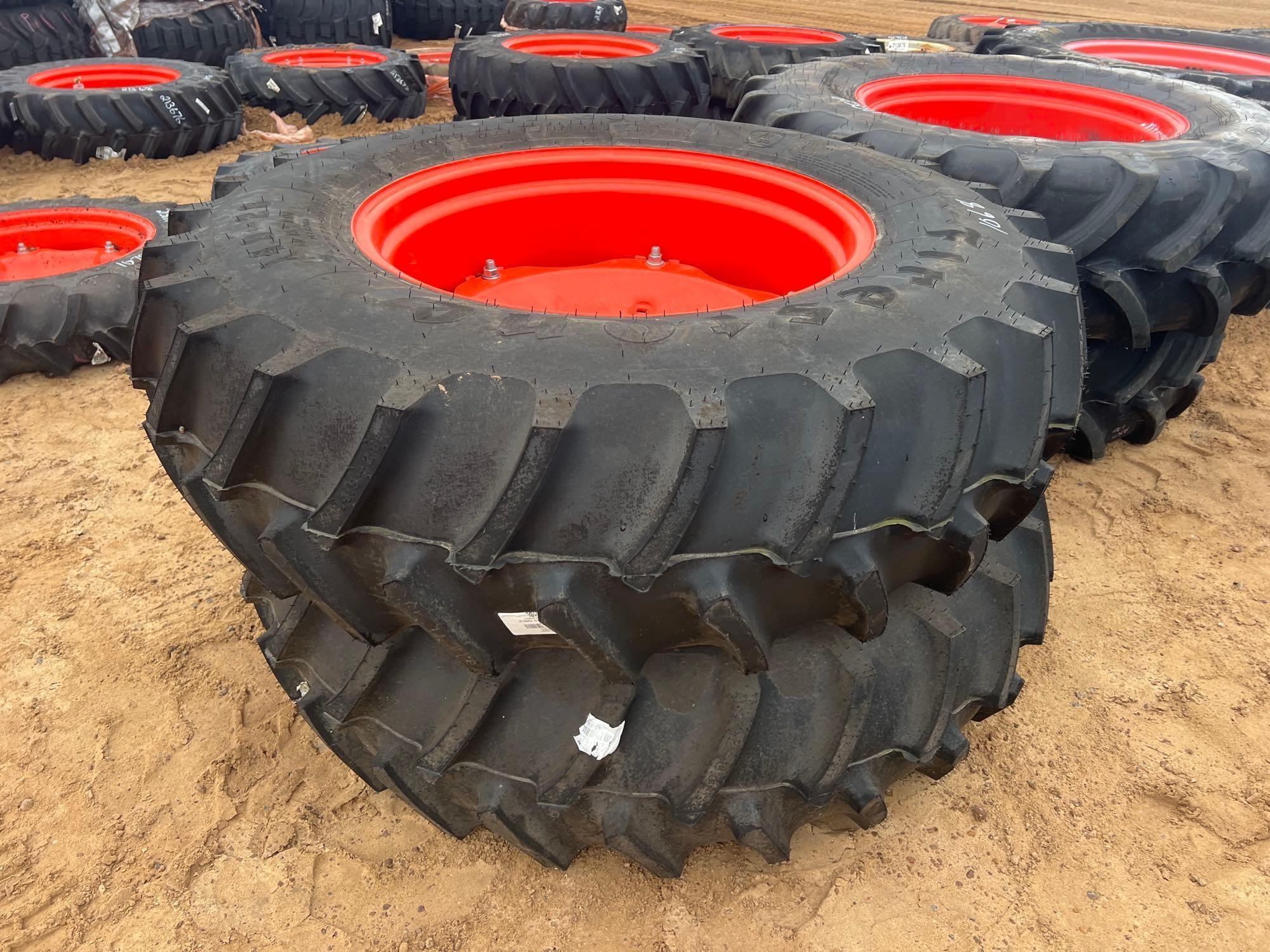 (2) UNUSED 14.9-28 TIRES W/ 8 LUG RIMS (A64280)