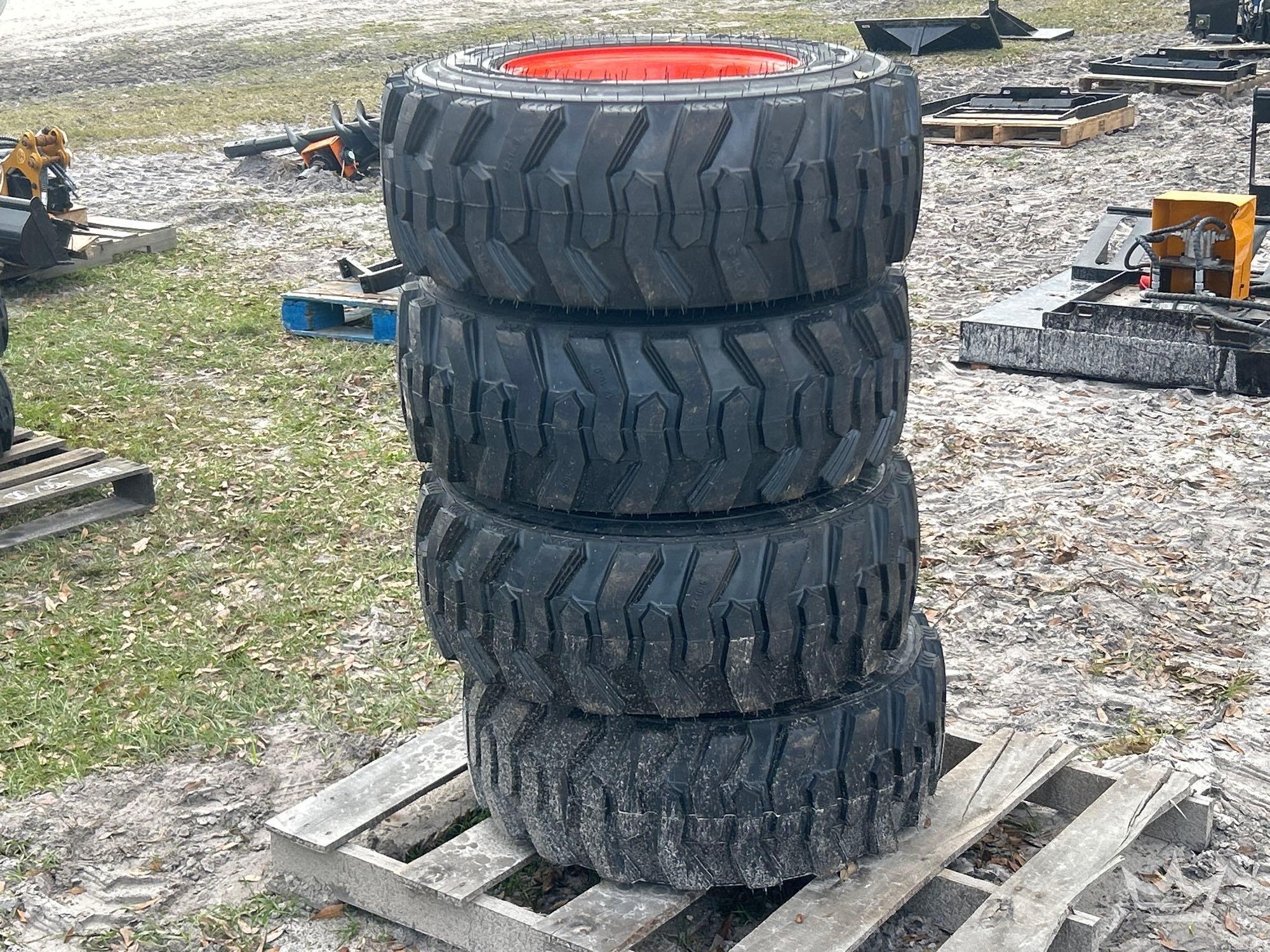 Lot of 4 12-16.5N.H.S. Skid Steer Wheels and Tires (A59228)