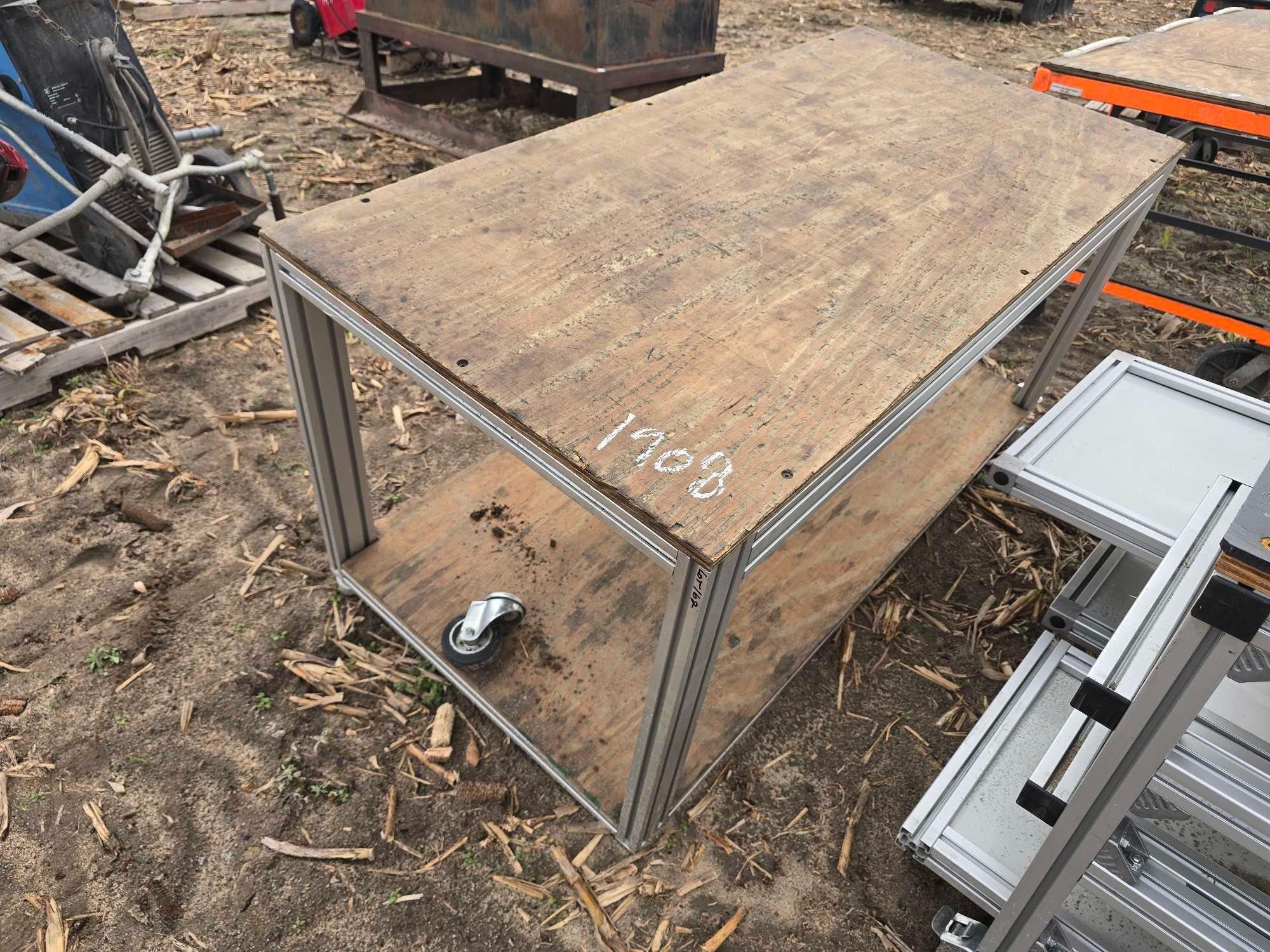60"x30" ALUMINUM AND PLYWOOD ROLLING TABLE (A58374)