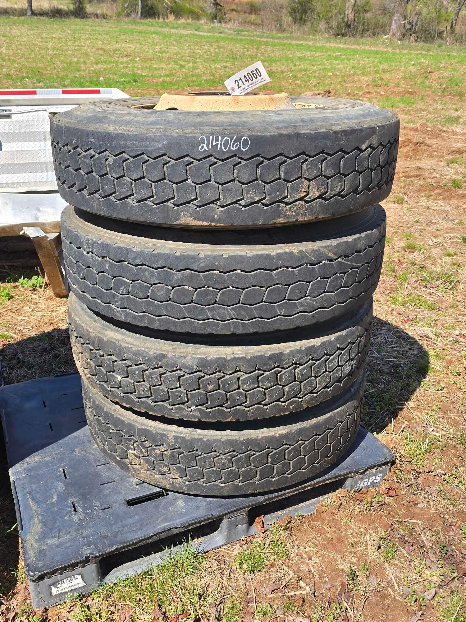 (4) 11R22.5 TIRES ON STEEL WHEELS (A64277)