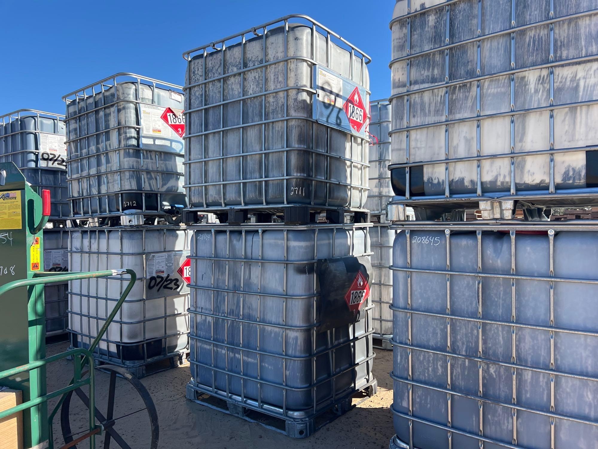 (1) 300 GALLON & (1) 330 GALLON POLY TOTES W/CAGES (A60432)