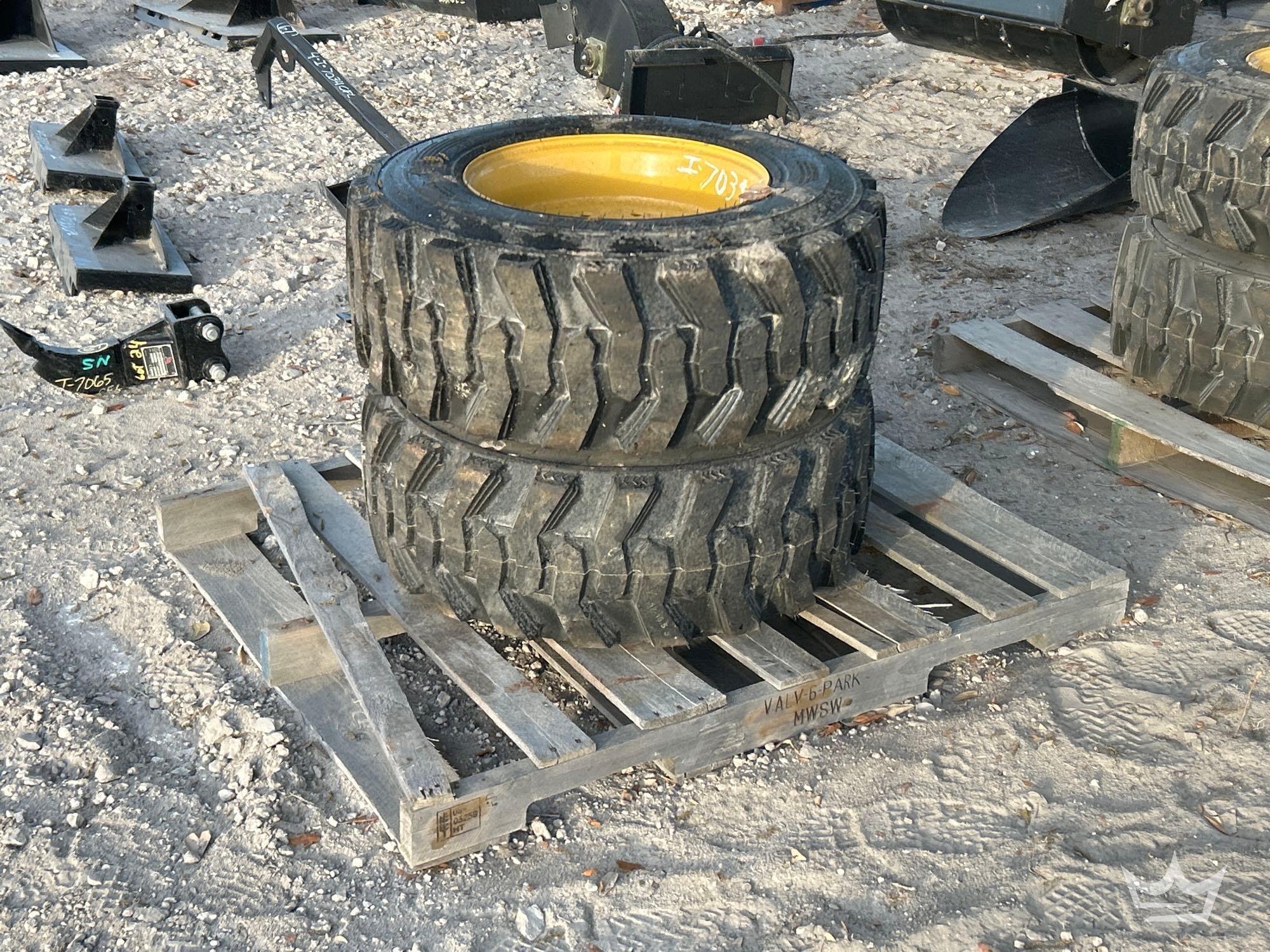 Lot of 2 ForeRunner 12-16.5N.H.S. Skid Steer Wheels and Tires (A64553)