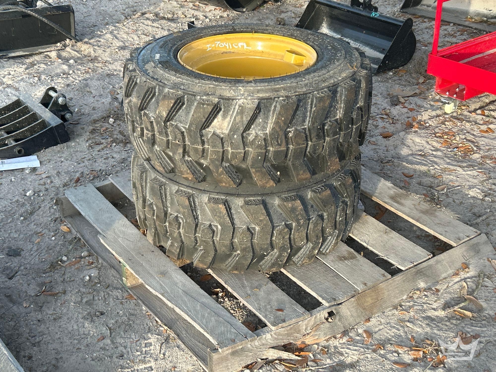 Lot of 2 ForeRunner 12-16.5N.H.S. Skid Steer Wheels and Tires (A64553)