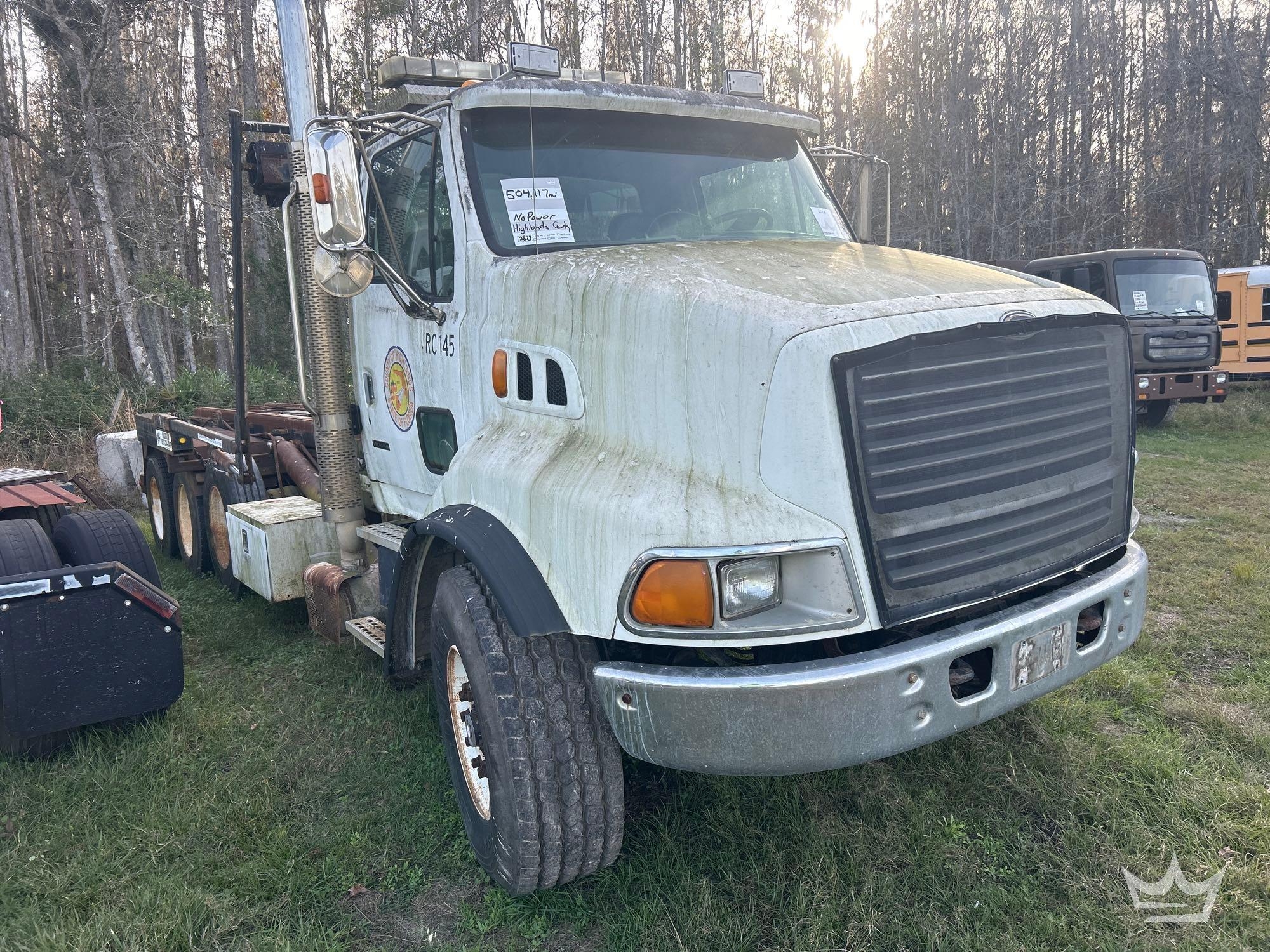 1999 Sterling L9513 Tri-Axle Roll Off Truck (A61568)