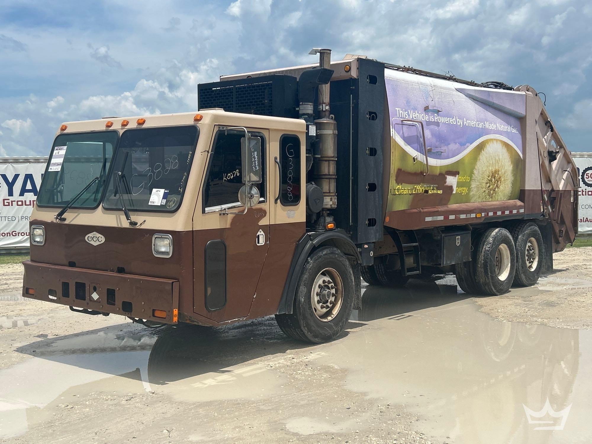 2012 Crane Carrier Low Entry T/A Rear Loader Garbage Truck (A55852)