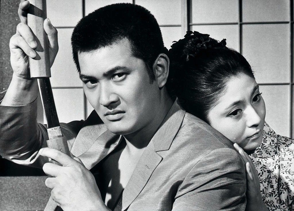 Akira Kobayashi - like 007 with samuri sword.jpg