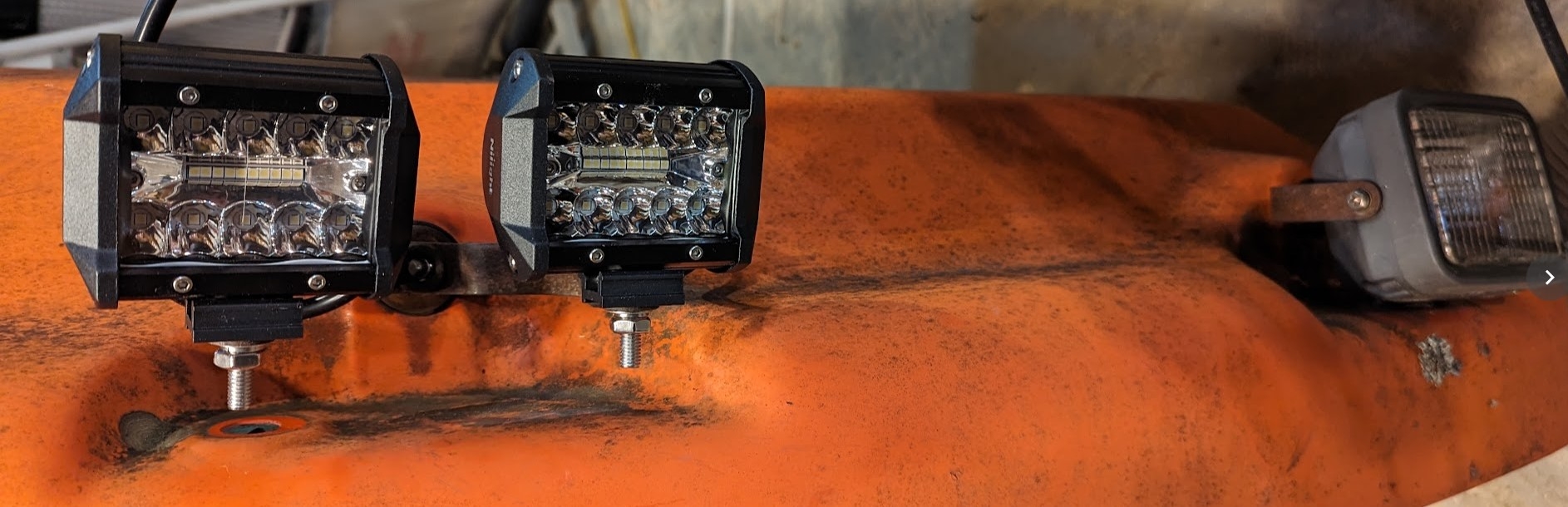 dk45 new cab lights front compare.jpg