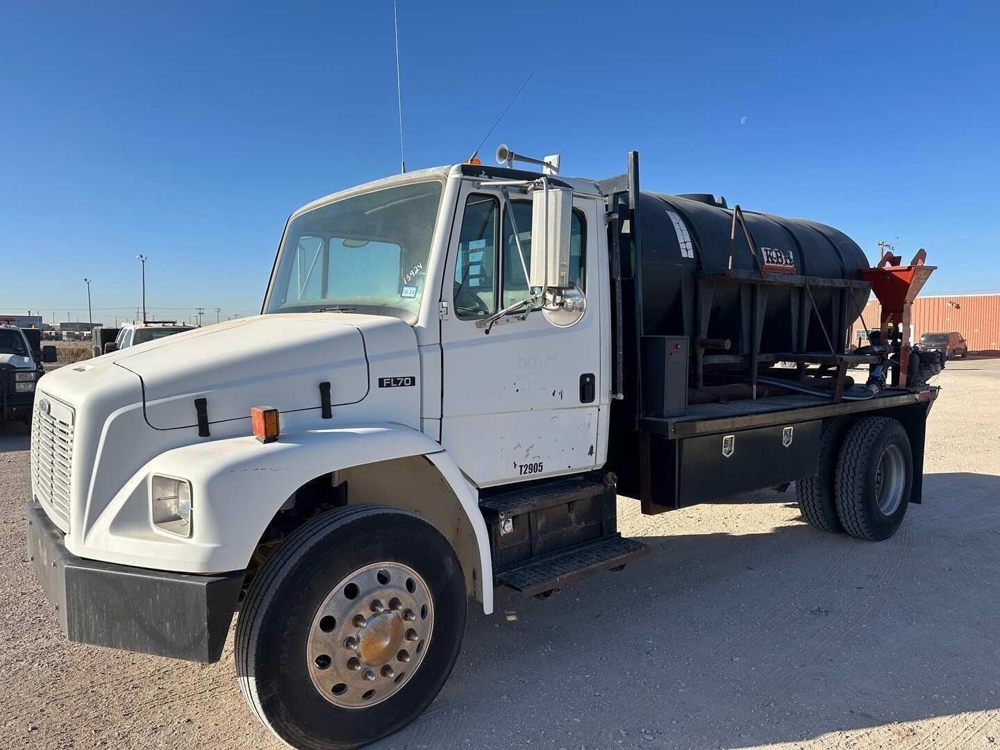 2004 FREIGHTLINER FL70 FLATBED W/TANK & DITCH WITCH MIXER (A55745)