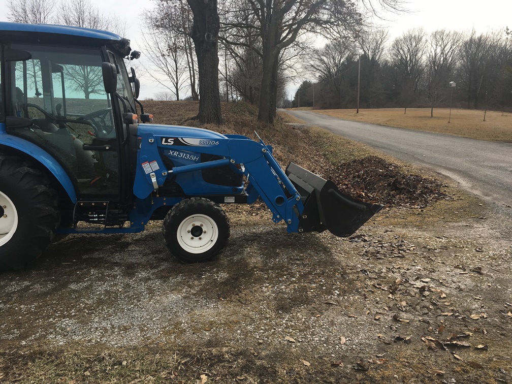 LS XR3135HC cleaning ditch.JPG