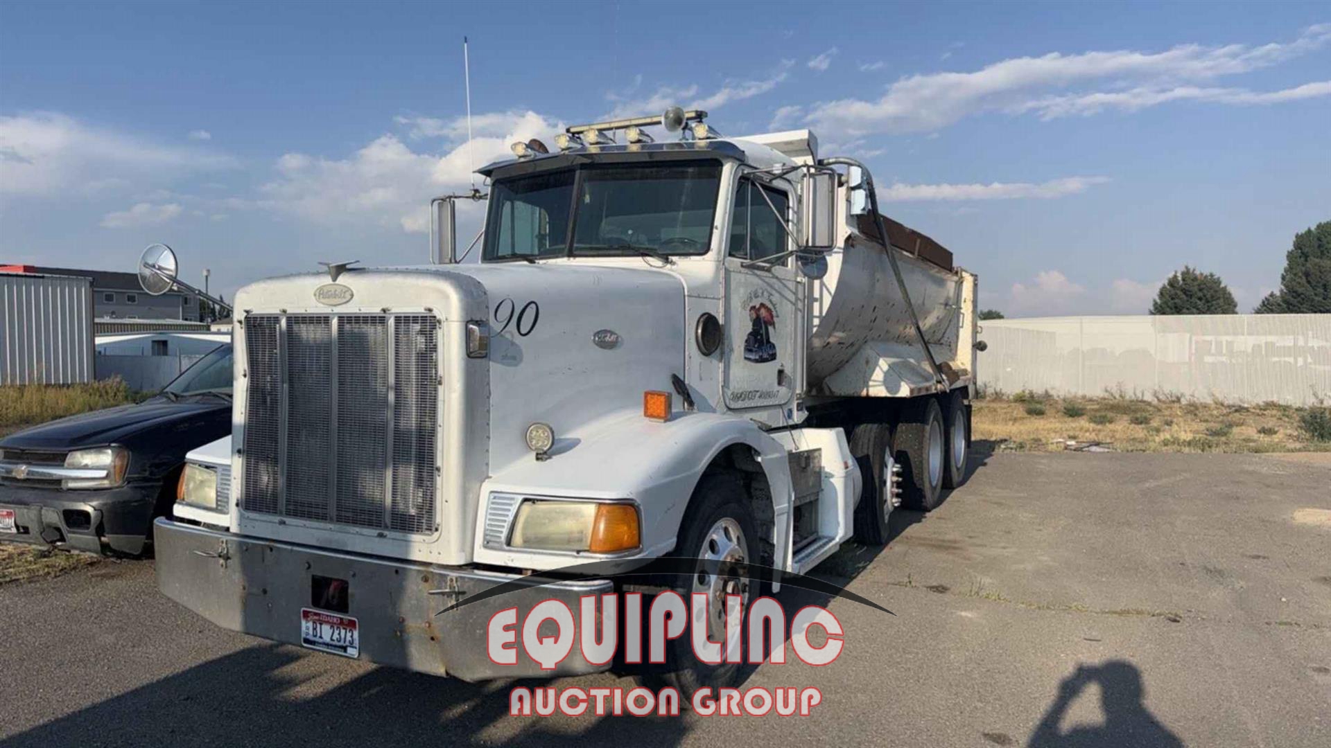 1995 PETERBILT 377 TRI  AXLE DUMP TRUCK (A56129)