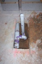 Drain lines cut into concrete slab.jpg