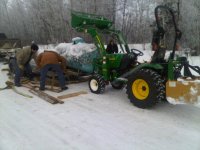 Propane tank being moved.jpg