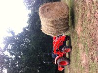 Big Bale on Kubota.JPG