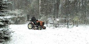 8-111090-tractor-rakecrop.jpg