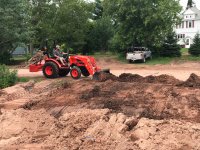 Tractor pushing dirt.jpeg