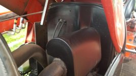 Fuel spray pattern onto exhaust muffler from fuel line that came loose.jpg
