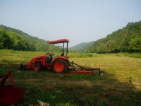 mowing the west pasture.jpg