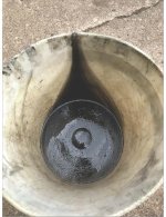 Sediment in hydraulic fluid.jpg