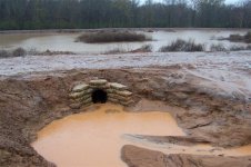 Culvert entrance with water flowing..jpg