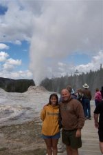 Steph & Eddie in front of erupting Beehive Geyser.jpg