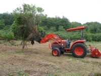 Millonzi 4 ft grapple on DK40se with bush.jpg