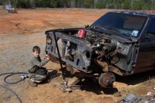 Peyton taking off the off a fender..jpg
