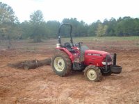 15  My Century 35 hp CUT pulling my log drag.jpg