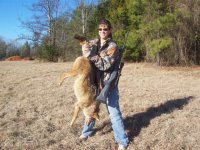 Steph holding up her 40lb coyote !!.jpg