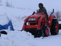 Pushing Snow in Front of Boat.JPG